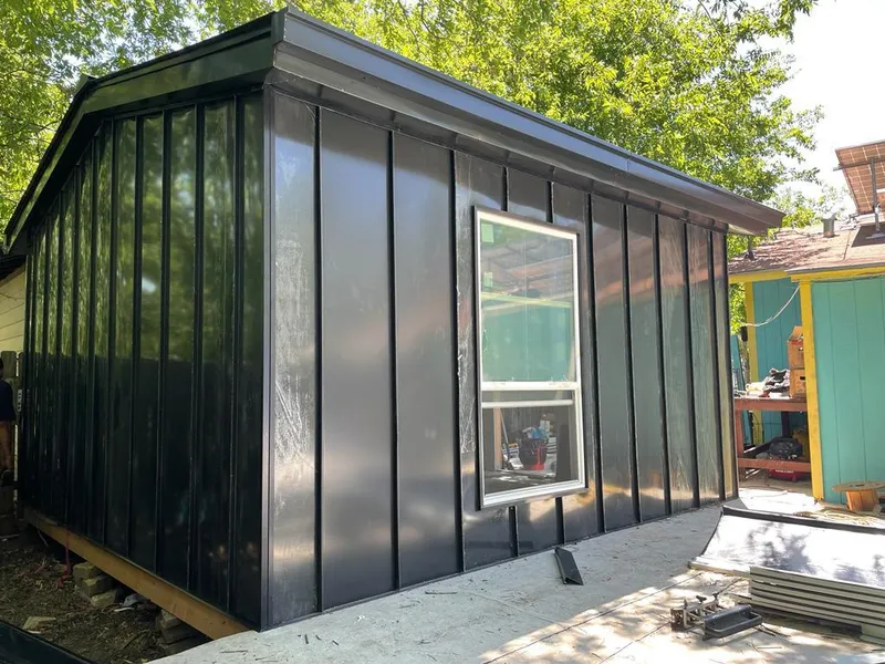 Black standing seam metal wall panels for Roof Inspection in El Cerro Mission