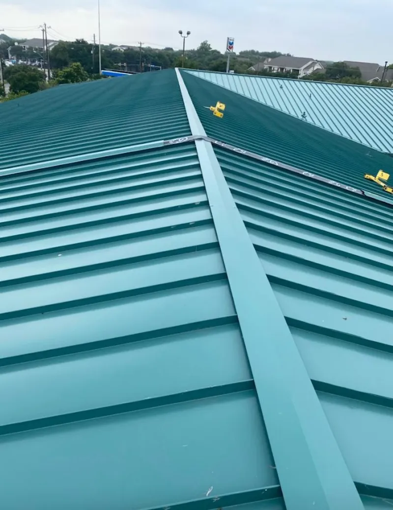 Green commercial metal roof ridge and valley for Metal Roof Repair in El Cerro Mission
